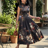Teodora | Robe midi à motifs floraux et décolleté haut